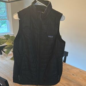 Black quilted vest, must have for fall and winter